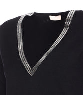 MAGLIA A MANICHE CORTE
