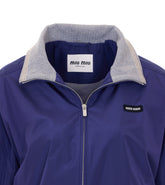 BLOUSON IN POPELINE TEC CON LOGO