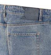 SHORTS IN DENIM COMPACT SHIELD