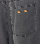 JEANS CON LOGO MIU MIU