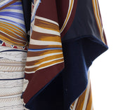 PONCHO REVERSIBILE CON STAMPA GIADA