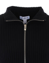 PEPLUM CARDIGAN WITH ENGINEREED RIBS