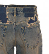 JEANS EFFETTO DISTRESSED