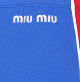 GONNA MINI CON LOGO MIU MIU
