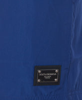 COSTUME CON PLACCA LOGO