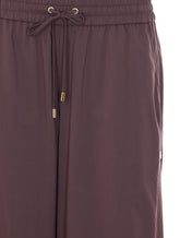 TROUSERS WITH SPLITS