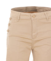 FLARE TROUSERS WITH LOGO BUTTONS