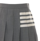 PLEATED 4-BAR MINI SKIRT