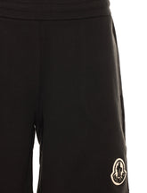 SHORTS CON LOGO