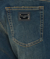 STRETCH REGULAR JEANS WITH PATCH LOGO