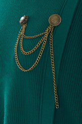 MAGLIA CON SPILLA