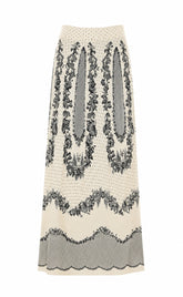 SATIN JACQUARD LONG SKIRT WITH FLOWERS AND POLKA DOTS PRINT
