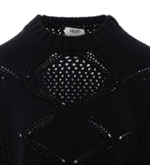 MAGLIA CON PERLINE E TRAFORATURE