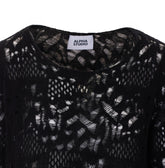 MAGLIA CON DETTAGLI PERFORATI
