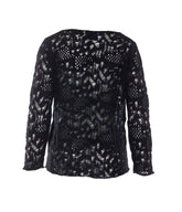 MAGLIA CON DETTAGLI PERFORATI