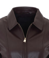 GIACCA IN FAUX LEATHER CON CINTURA