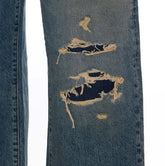 DISTRESSED JEANS