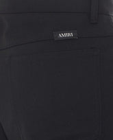PANTALONE SLIM BOOTCUT