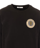 FELPA CON PATCH LOGO