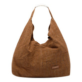 BORSA A SPALLA ELLISSE CROCO IN SUEDE